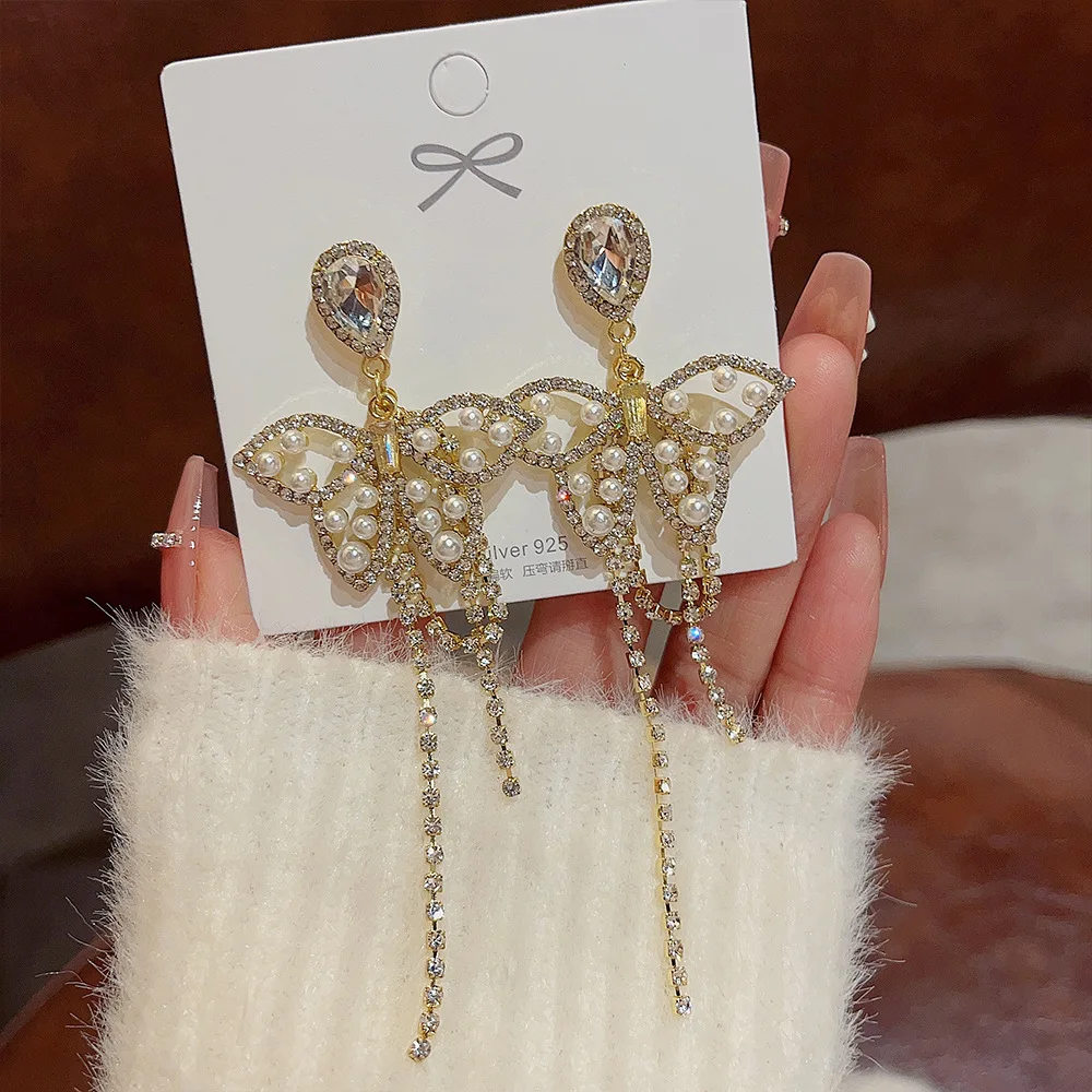 

Женские серьги-гвоздики из серебра пробы с длинной бахромой