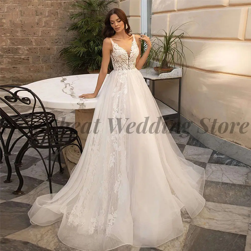 

2023 V-Neck Wedding Dress A-Line for Brides with Court Train Sleeveless Lace Appliques and Button Back Gorgeous Robe De Mariee