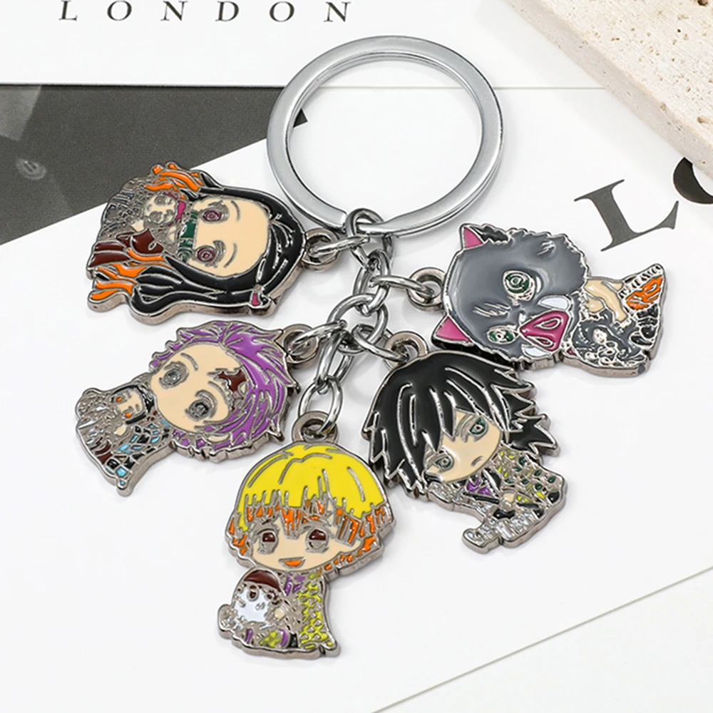 

Anime Demon Slayer Kamado Tanjirou Keychain Cartoon Figure Hashibira Inosuke Agatsuma Zenitsu Metal Pendant Keyring Toy Gift