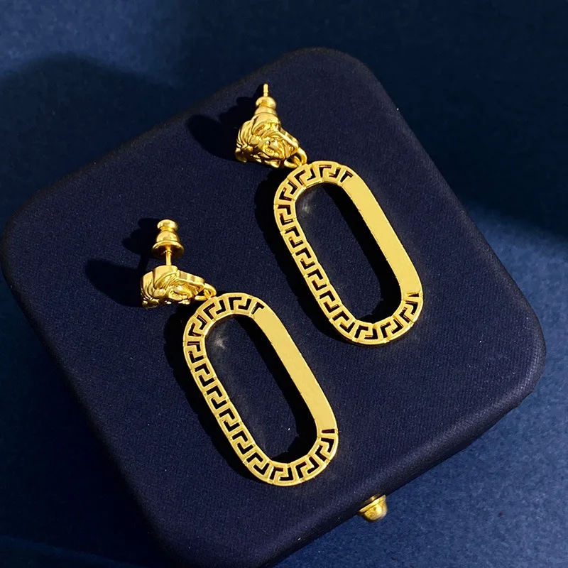

European and American hollowed out oval pendant earrings