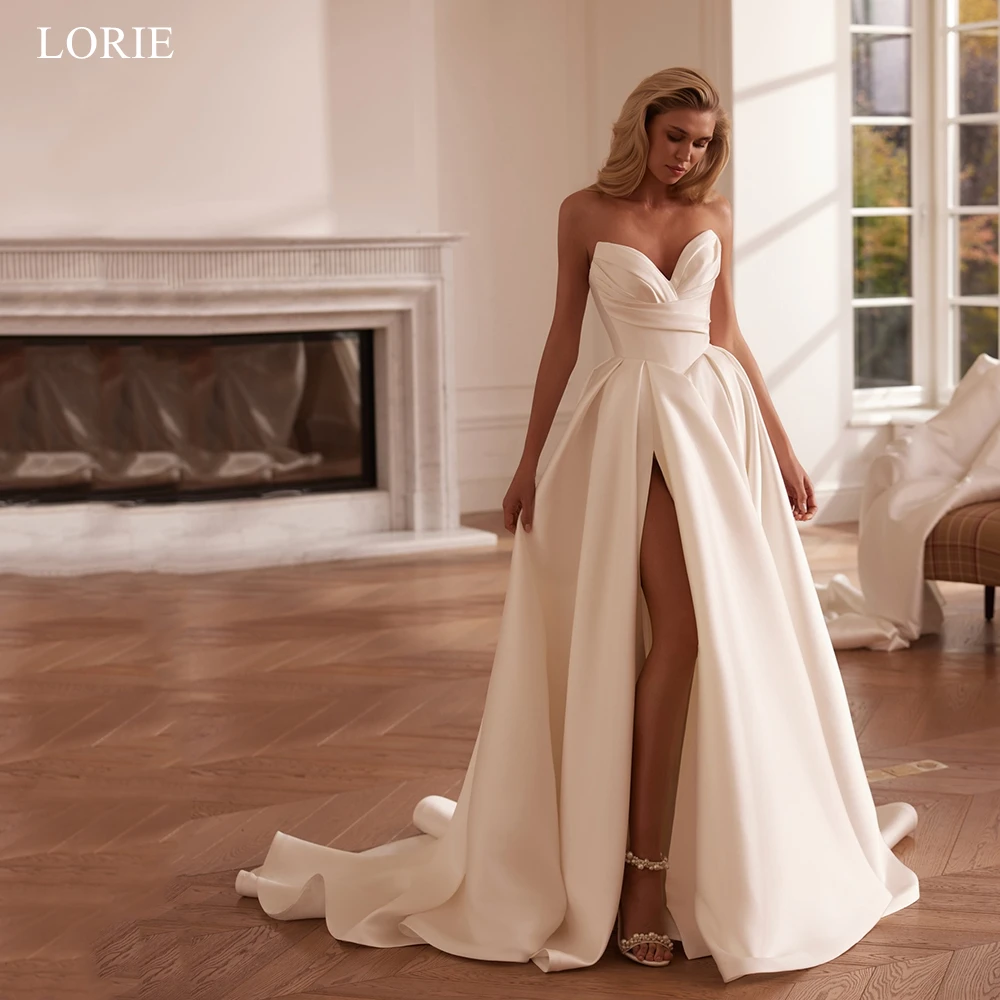 Фото Свадебное платье LORIE из атласа без бретелек с глубоким вырезом, на шнуровке, А-силуэт, с высоким разрезом, женское, на заказ №1