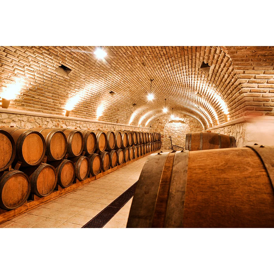 Wine Barrels in the Old Basement of a Winery Storage Cellar of Restaurant Wine Vault Photography Background Party Poster Banner