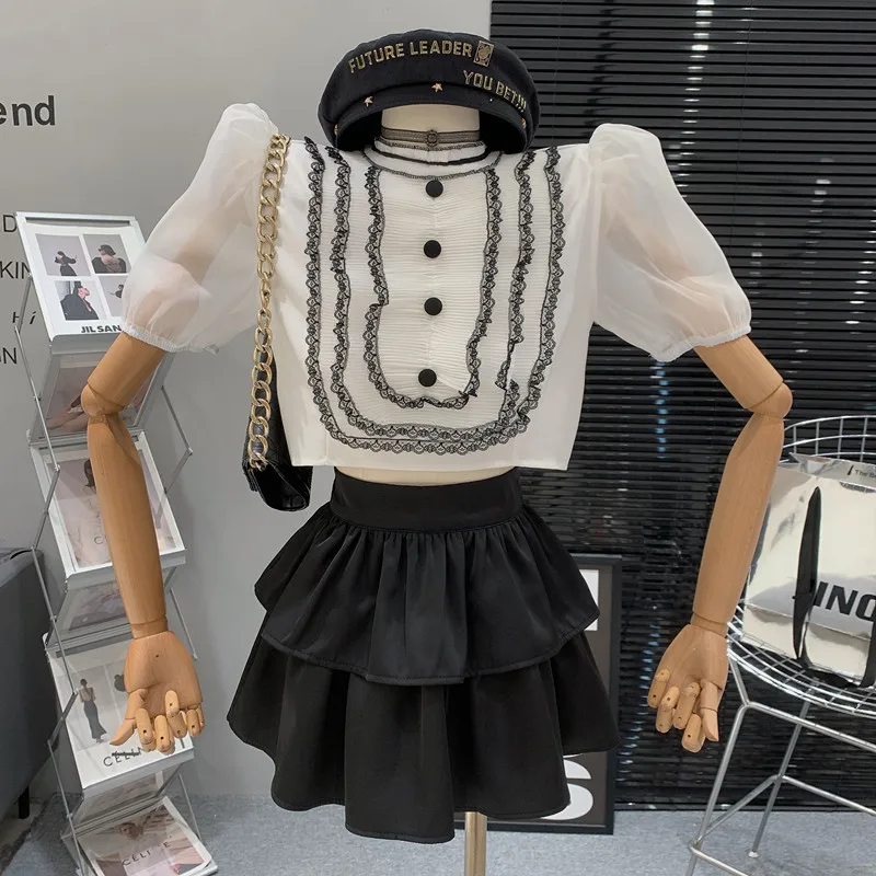 

2023 Summer New Lace Patchwork puff Short sleeve shirt top High waisted fluffy skirt Two piece set