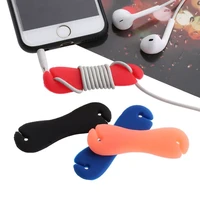 1 pcs random color bone shaped headphone earphone organizer wire holder cable organizer rubber cable winder cable holder new