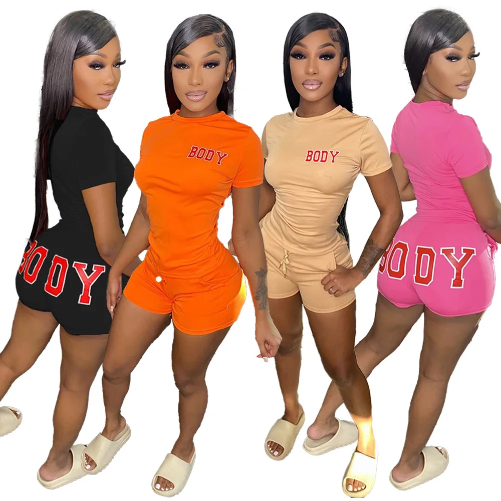

60A5296 Spring and Summer Women Casual Fashion Solid Letter Offset Printing Short Sleeve Shorts Sports Two Piece Set Hot
