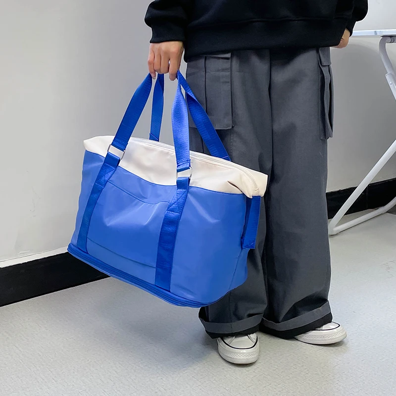 Korean Version Of Travel Bag Female Light Fitness Business Trip Portable Light Luxury Folding Luggage Storage Bag Handbag M615