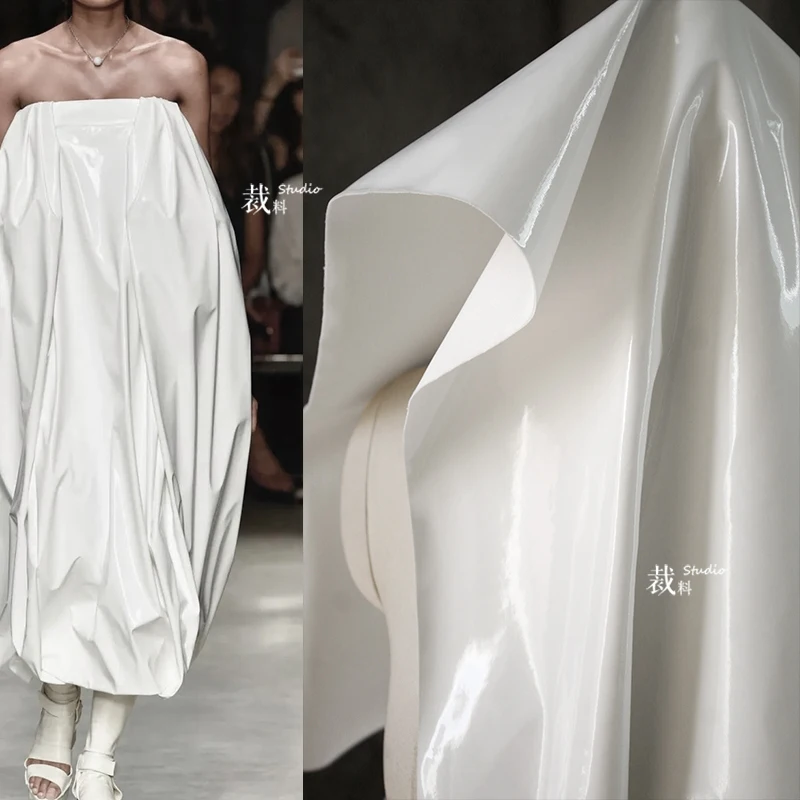 

White Patent Leather PU Paint Glossy Waterproof Designer Fabric High-Grade Hard Profile Fashion Coat Background Fabric