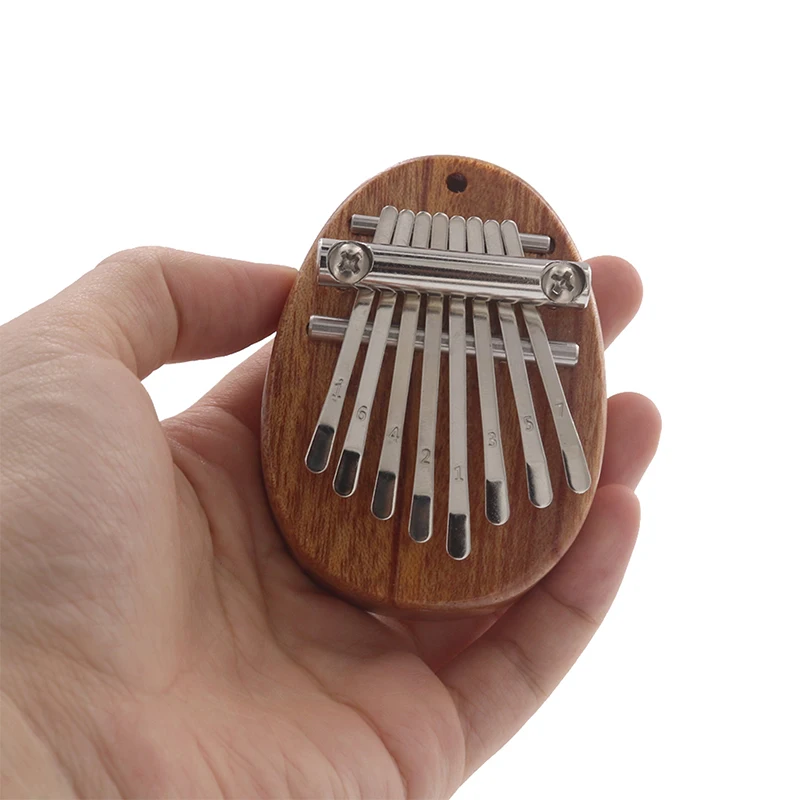 

Portable Mini Kalimba Finger Thumb Piano Musical Instrument for Beginners Kids