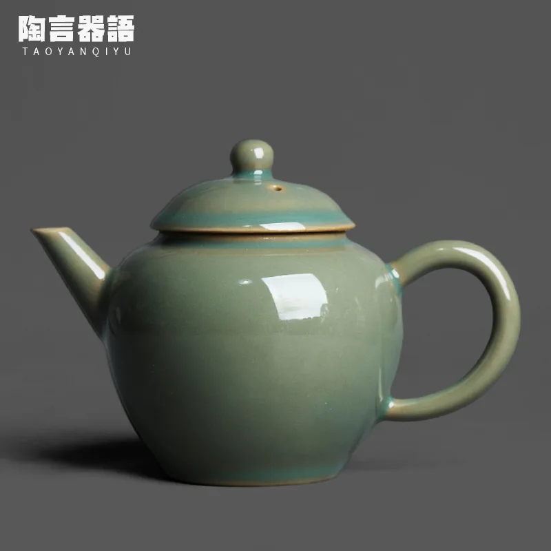 

Original mine Yue kiln celadon hand-held teapot handmade retro pottery Kung Fu tea ceremony tea maker small single pot