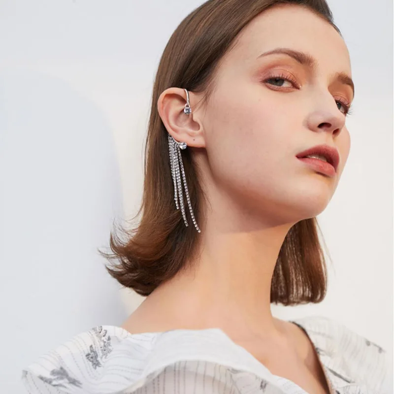 

New exaggerated crystal stone earrings stars and moon ladies personalized tassel single ear clip earrings for women