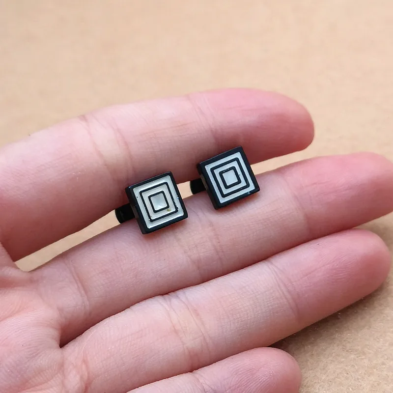 

Черные масляные серьги-гвоздики из нержавеющей стали 316L