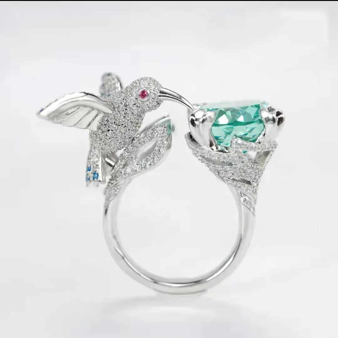 

Luxurious and elegant diamonds imitate Santa Maria Aquamarine Hummingbird Ring, haute couture fancy jewel opening women's band