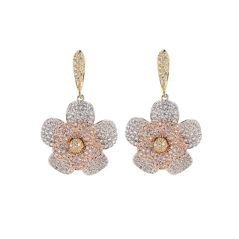 

Роскошные женские серьги-подвески с тремя искусственными цирконами и стереоскопическими лепестками