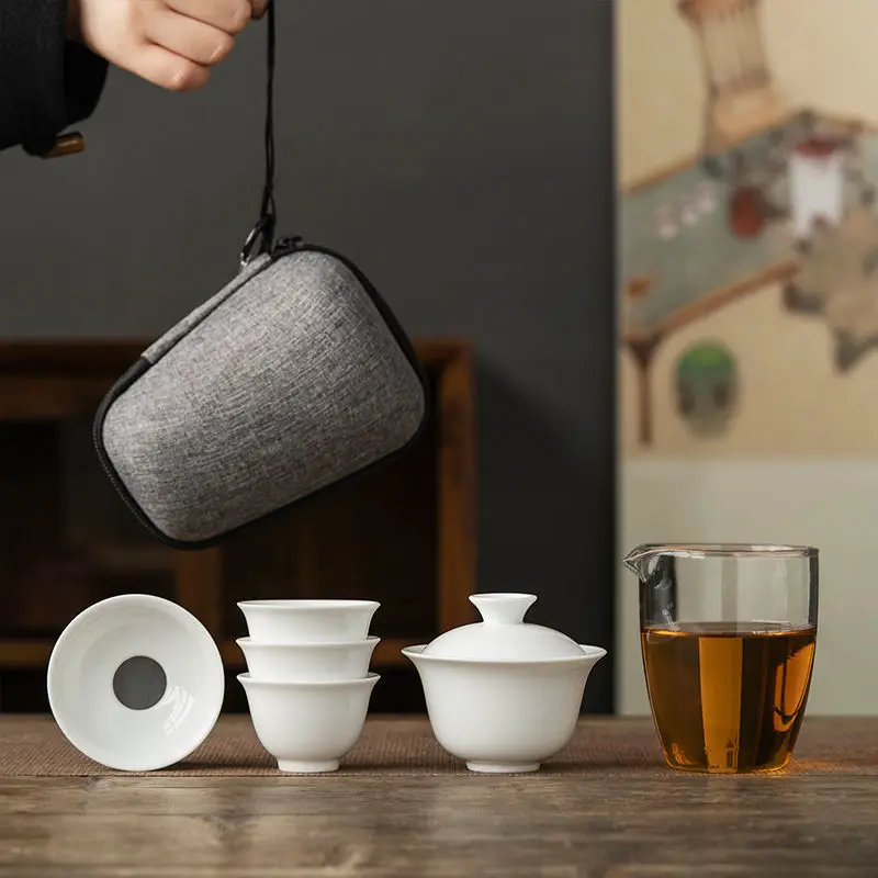 

China White Porcelain Travel Kung Fu Tea Set Cover Bowl Teacup Glass Crack Cup Portable Bag Tea Set Ceramic Tea Set Teaware