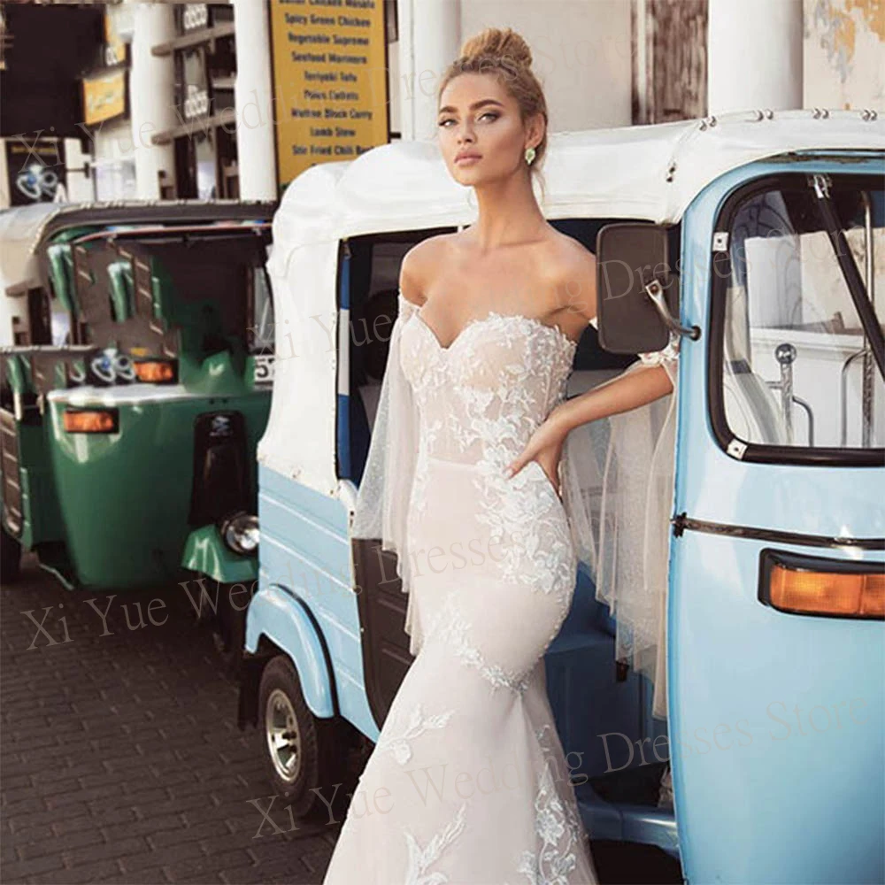 Элегантные свадебные платья русалки 2025 года кружевные аппликации без бретелек
