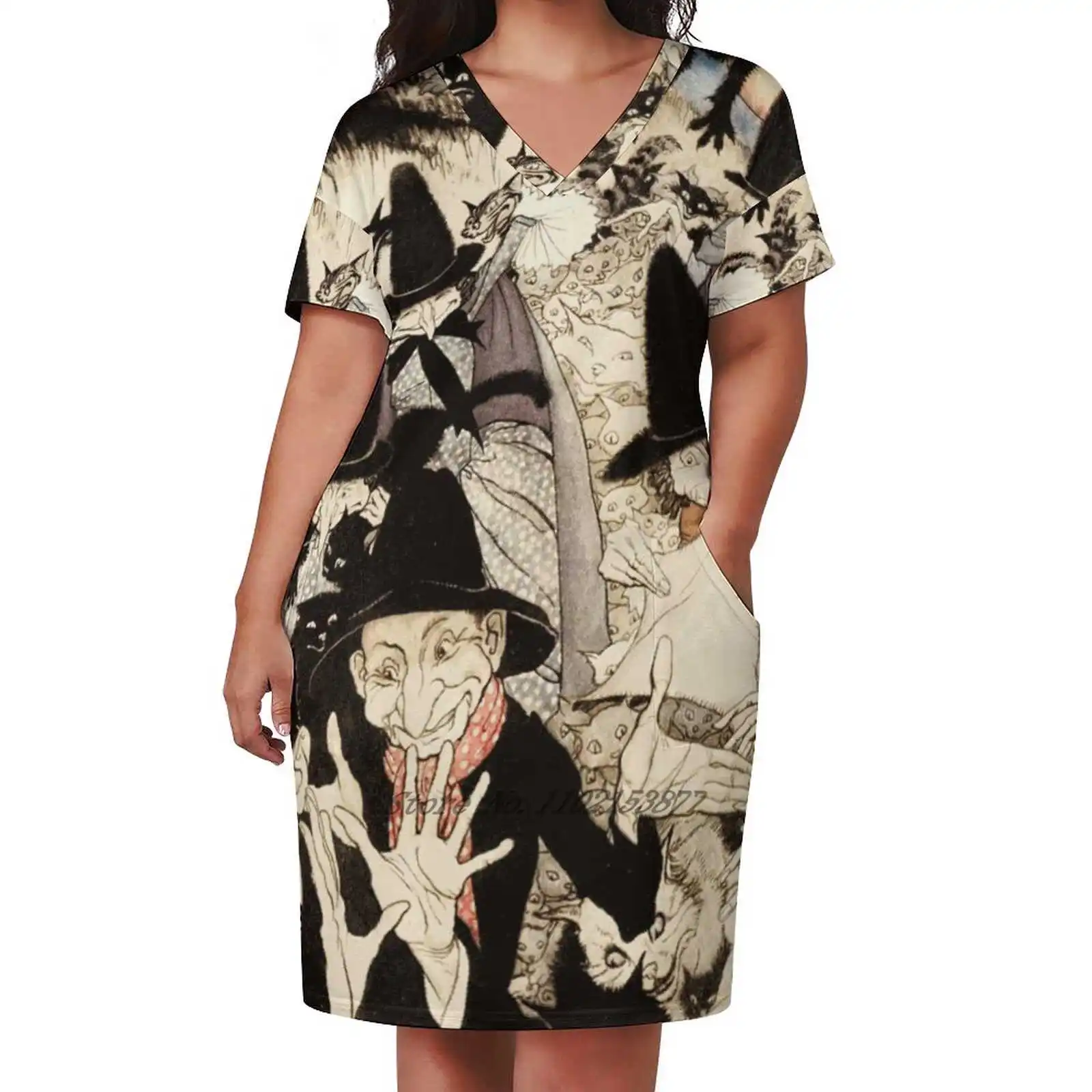 Свободное платье с карманами коротким рукавом и V-образным вырезом |