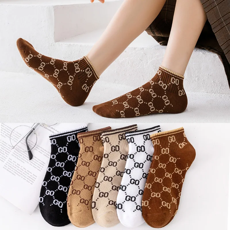 

2022 new men women letters GO personality hip hop street casual trend sports European and American couples in the tube socks