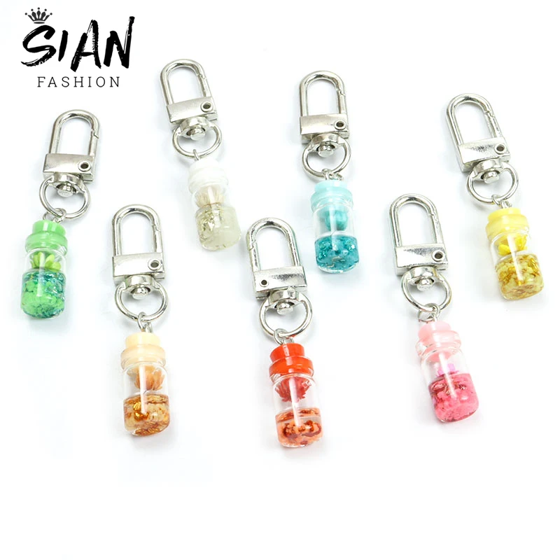 

Glass Bottle Dried Flowers Earphone Case Pendant Keychains Holder Eternal Flower Pendant Keyring Headphone Box Jewelry Souvenirs