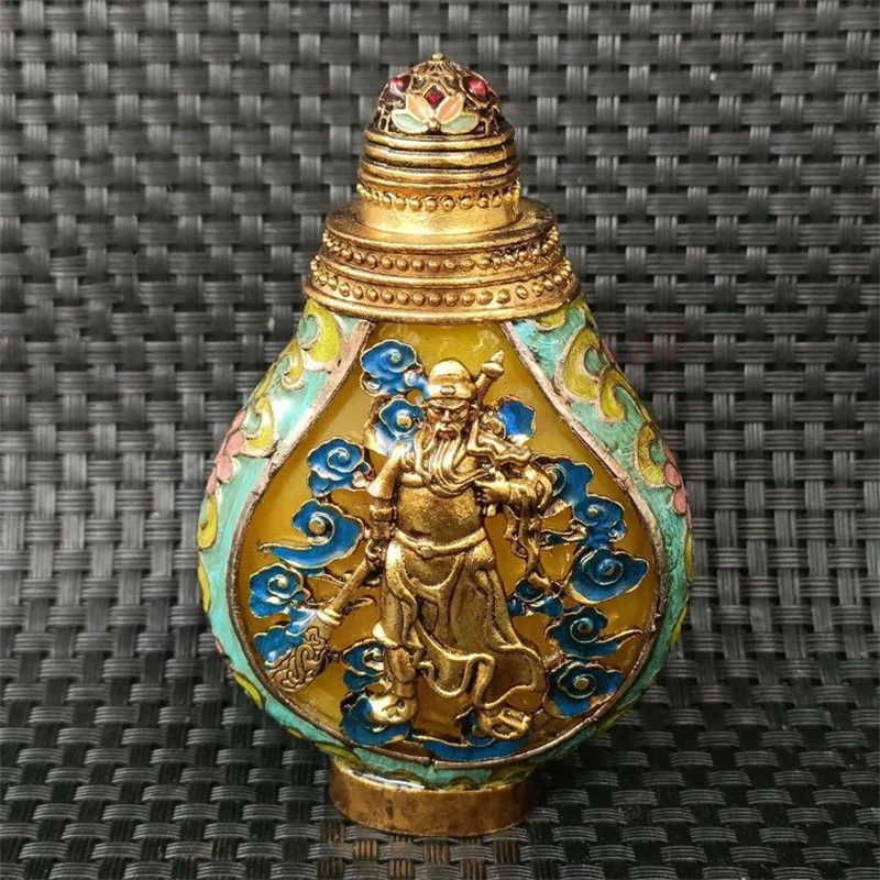 

Tibetan bronze snuff bottle, double-sided hollowed out Guan Gong inlaid snuff bottle,Old thing