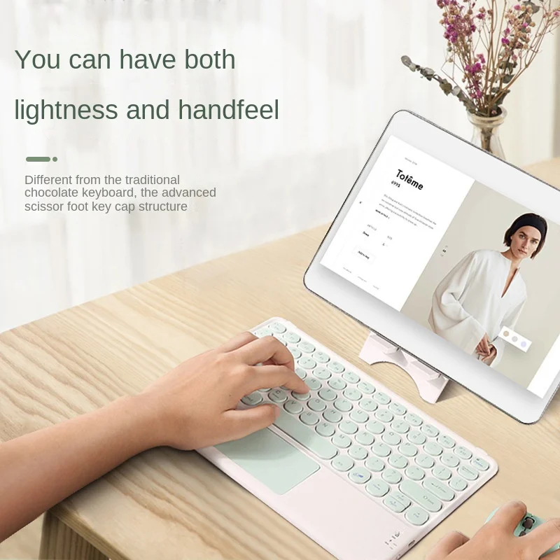 

Suitable for IPAD Wireless Bluetooth connection Flat Touch round cap color keyboard light Mini round charging portable ipad
