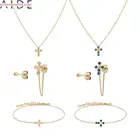 Женские серьги-подвески в виде креста