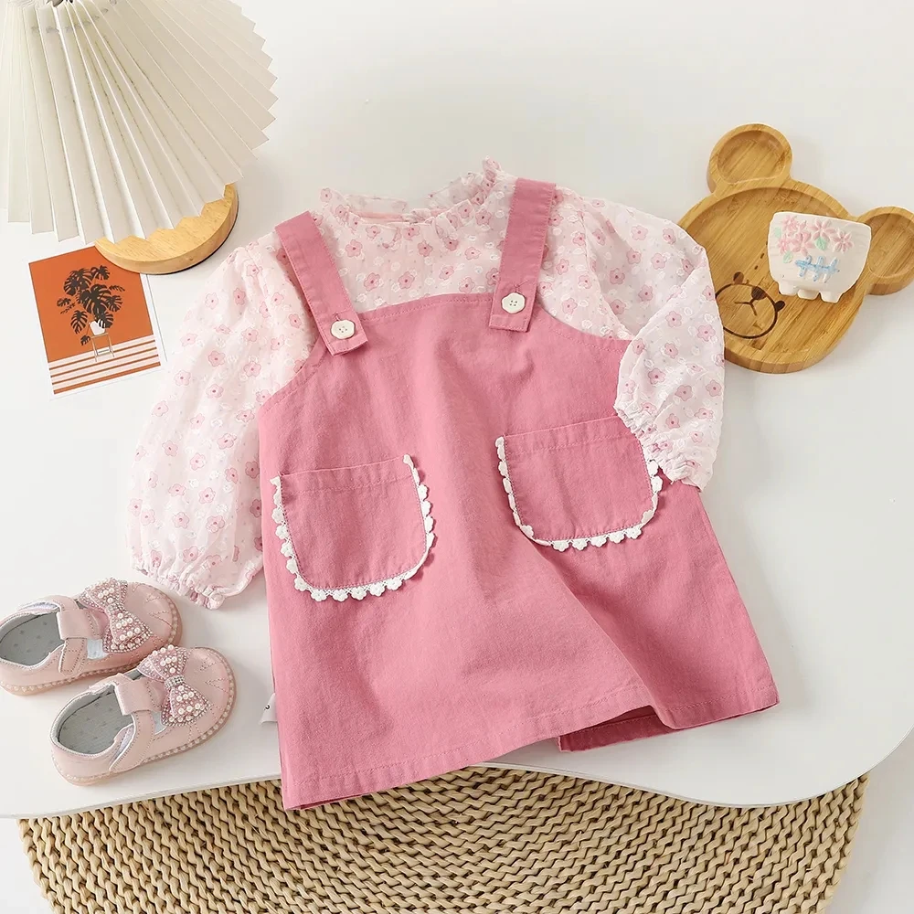 

Spring and Autumn Girls' Clothing Set Korean Version New Baby Cotton Long Sleeve Flower Shirt Strap Dress Two Piece Set