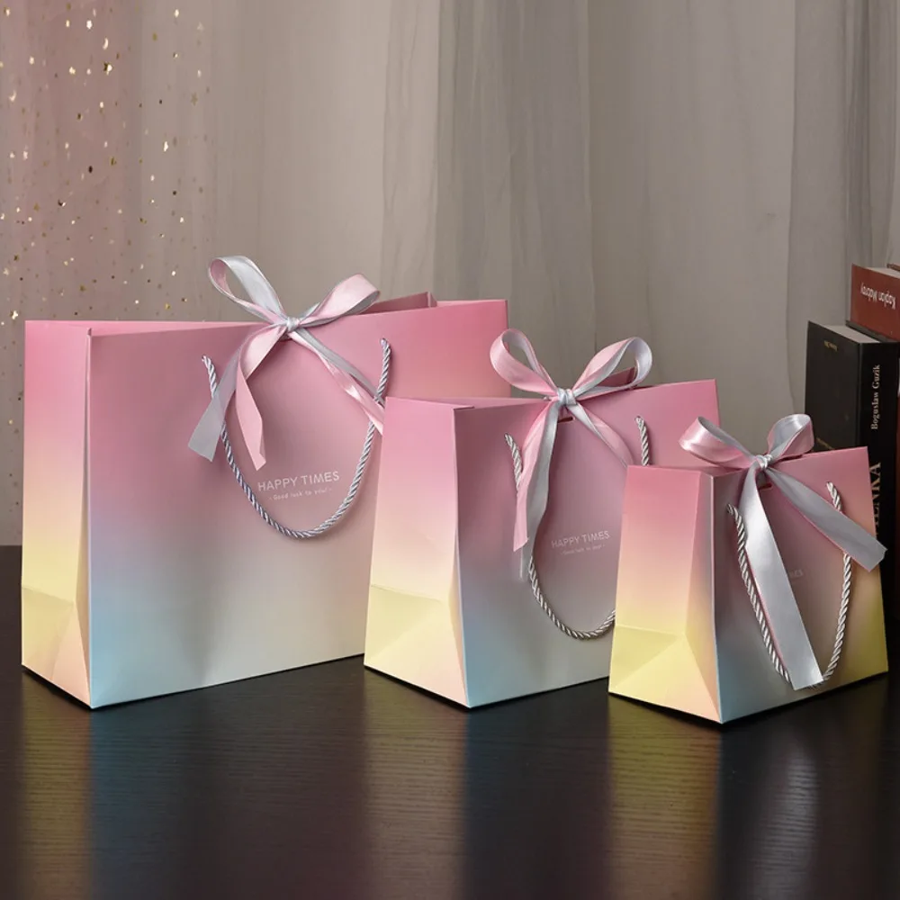 

Подарочные пакеты картонные розовые