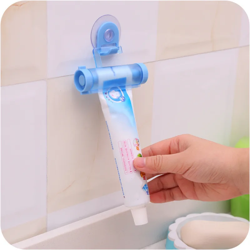 

Plastic Rolling Tube Squeezer Toothpaste Cheap Tooth Paste Dispenser Sucker Holder