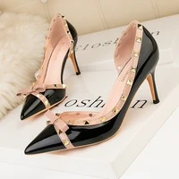 sexy nightclub slim womens pumps thin high heel shallow mouth pointed side hollow rivet single shoes