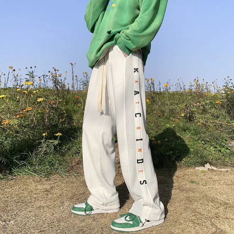 

Men's Summer Pants 2022 Stitching Striped Pants Men's Trend Loose Sports Sweatpants Casual Trousers Casual Pants Men