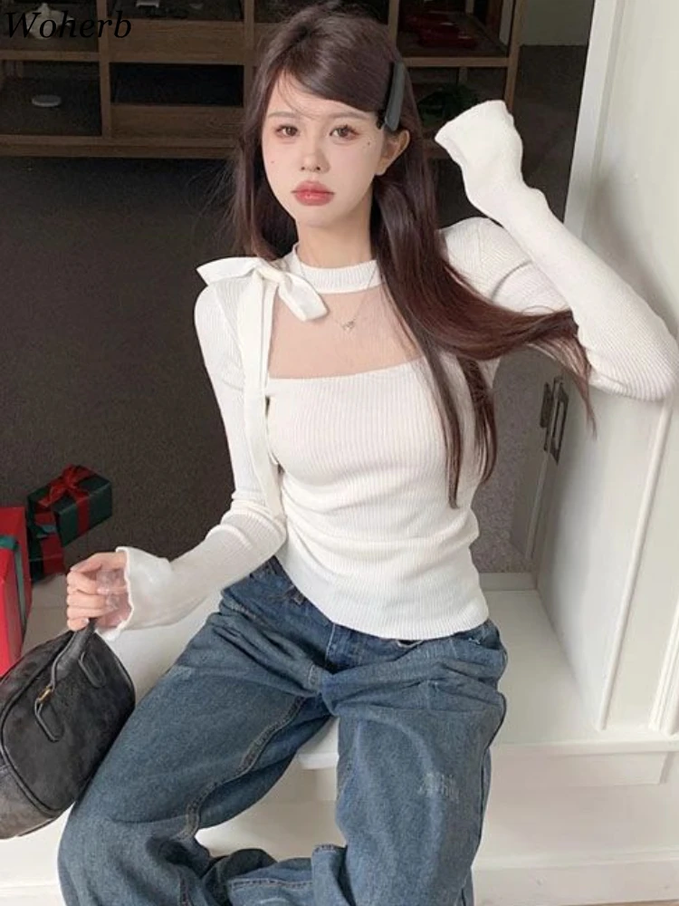 Женский укороченный свитер с бантом