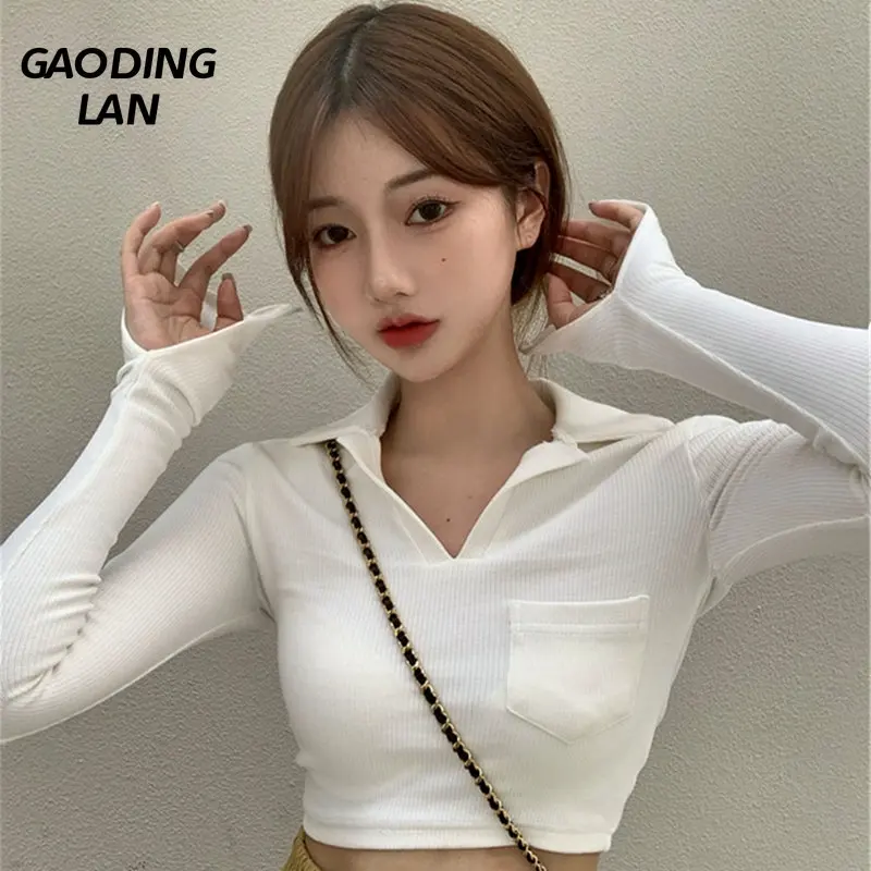 

Осенне-зимние женские топы с отложным воротником и длинным рукавом, однотонные облегающие короткие футболки с открытым пупком, эластичная ...