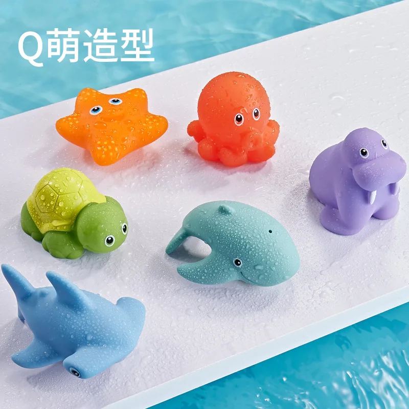 

Baby bath toys lion water spray net fishing sharks children and animals pinch music floating water toys.