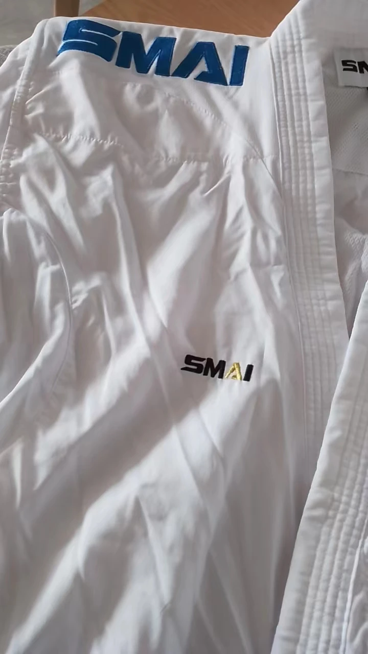 Фото Официальное обозначение карате GI SMAI Kumite WKF утвержден kumite Master K1 Премьер-лига каратэ GI Униформа используется для соревнований №3