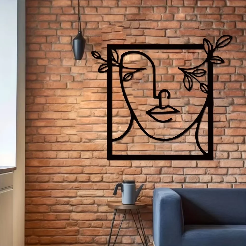 Металлическая стена искусство женщина лицо с листьями-символ элегантности.