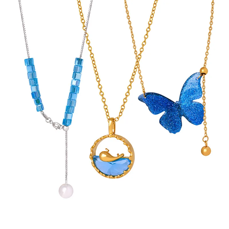 

ALLNEWME Handmade 18K Gold Plated Titanium Steel Clear Blue Glass Crystal Resin Hollow Coin Butterfly Pendant Chokers Necklaces