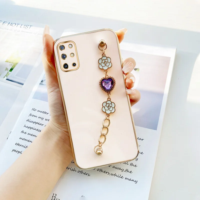 

Wristband Phone Case for OnePlus 8T 9 9 Pro Nord 2 5G Nord CE 2 5G Purple Heart Flower Bracket Cases Luxury Girl Love Chain