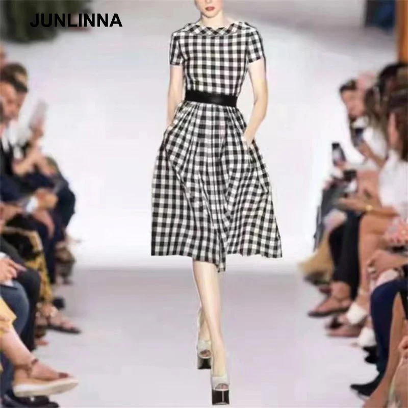 

JUNLINNA Runway Fashion Women Princess Dress Peter Pan Collar Short Sleeve Black White Plaid Printing Vestidos Sliming Dresses