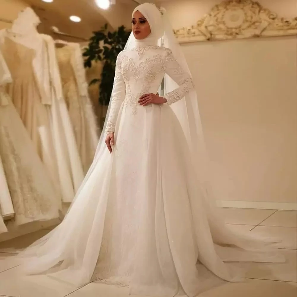 

Ivory Muslim Hijab Wedding Dresses Gown With Overskirt Pearls Beaded Lace Appliques Long Arabic Dubai Islamic Wedding Gowns