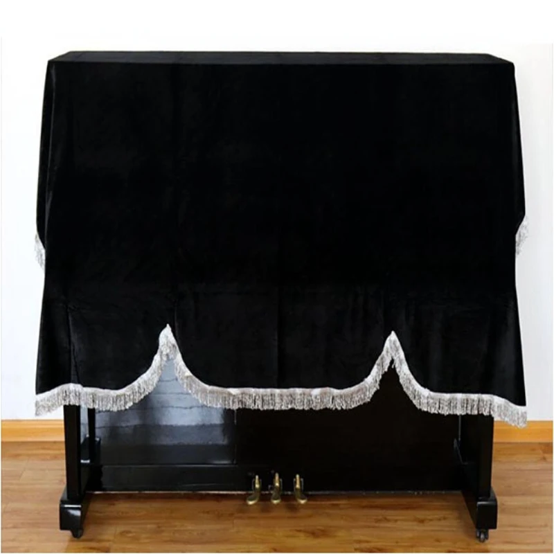 

New gold velvet piano cover half covered with piano cover