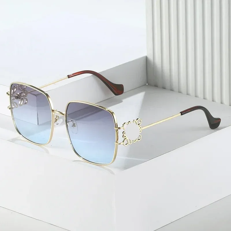 

New Luxury Brand Design Hollow Sunglasses Women 2023 Trendy Metal Frame Female UV400 Shades Ladies Wearing Travel Sun Glasses