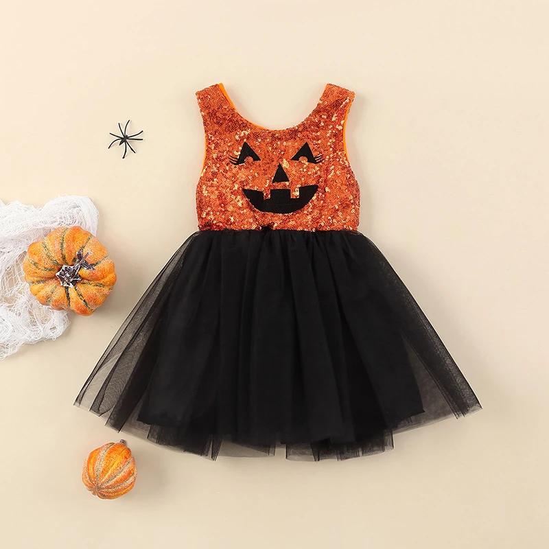 

Детское платье-пачка без рукавов с блестками и круглым вырезом