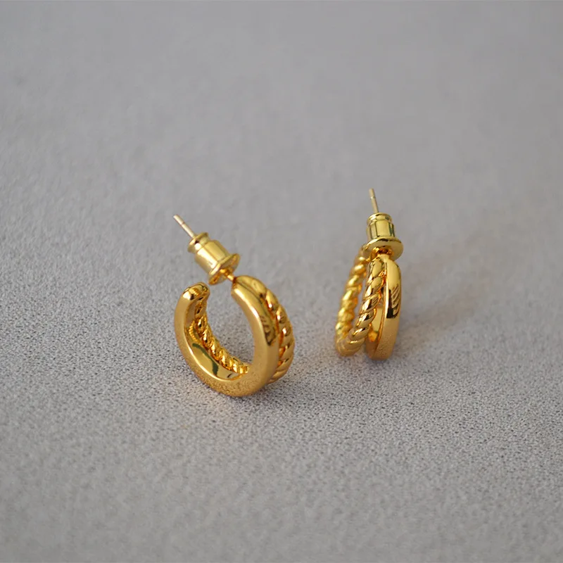 

Korean cold wind simple double ring twist 925 silver needle temperament earrings earrings earrings women
