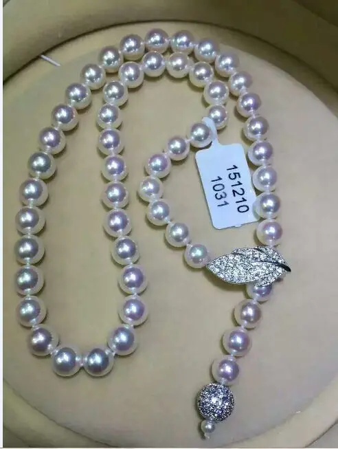 

classic 10-11mm round white pearl necklace 24"
