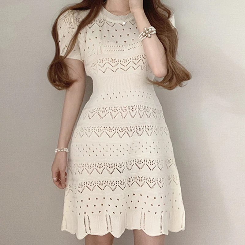 

Chic Temperament Korean Version Hollow Summer Fashion Round Neck Short Sleeve Beautiful Jacquard Slim Solid Color Knitted Dress
