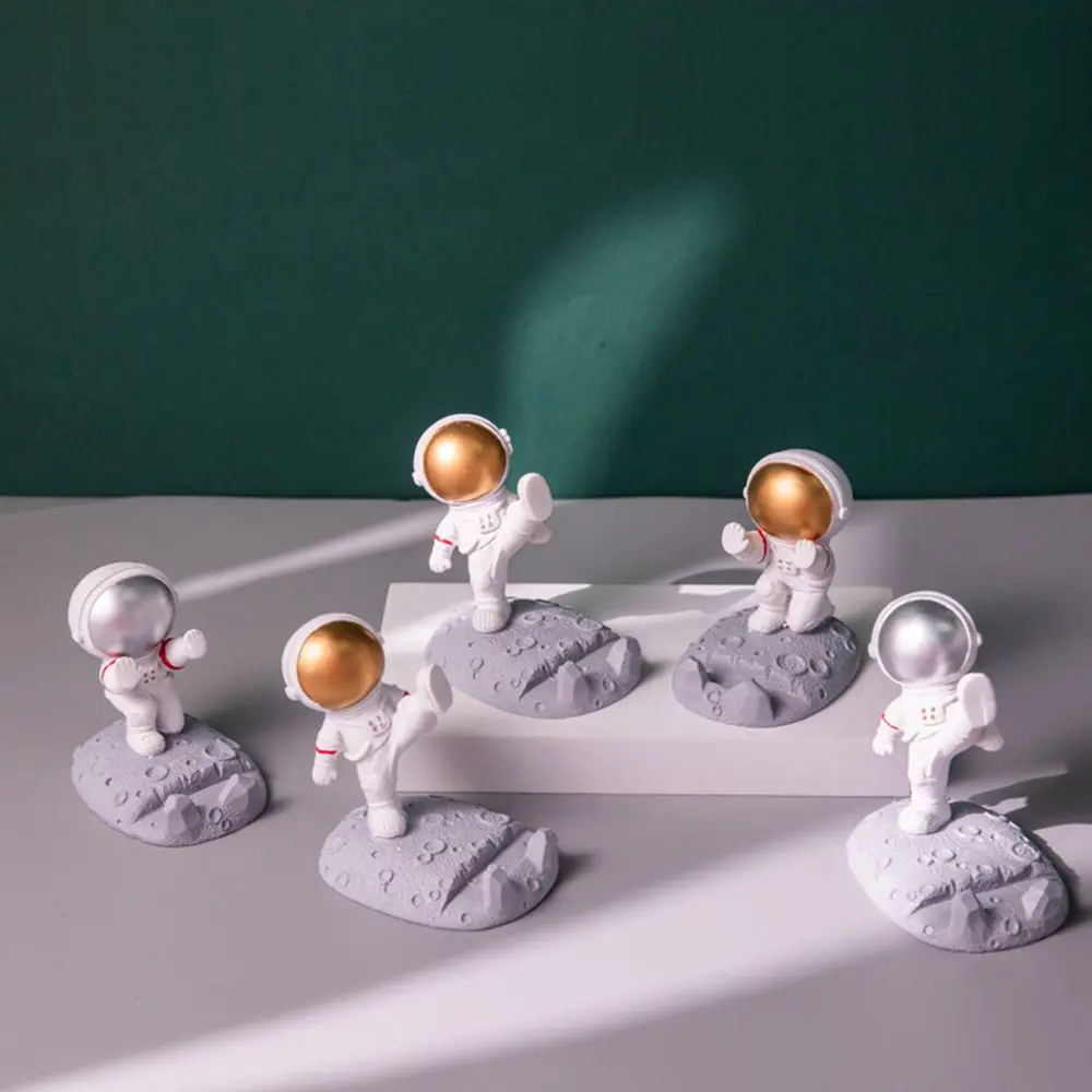 

Home Decoration Resin Phone Holder Cake Topper Cosmonaut Astronaut Figurines Miniatures Spaceman Phone Bracket Ornament