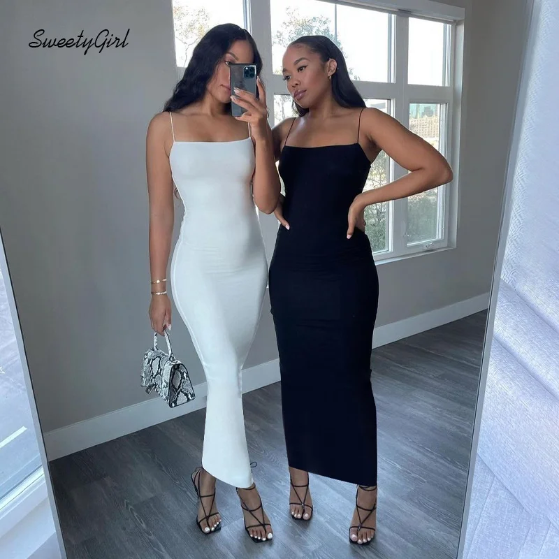 

Женское привлекательное длинное облегающее платье SweetyGirl на бретельках