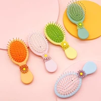 12pcs mini air cushion comb cute soft cute children massage comb abs hairdressing comb gift daisy head rope spot wholesale 2022