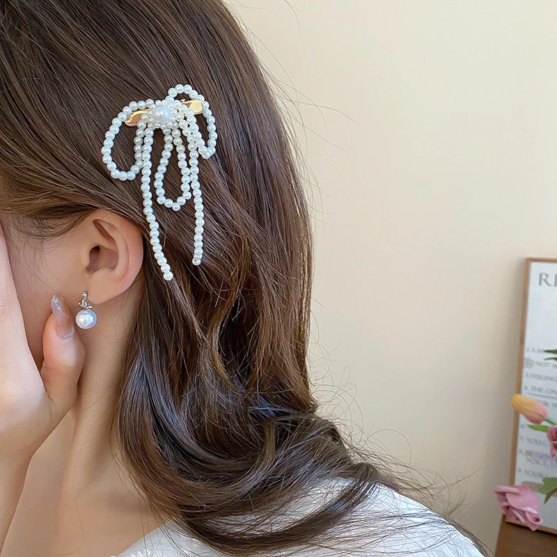 Заколка для волос с бантом из искусственного жемчуга и цветком текстура