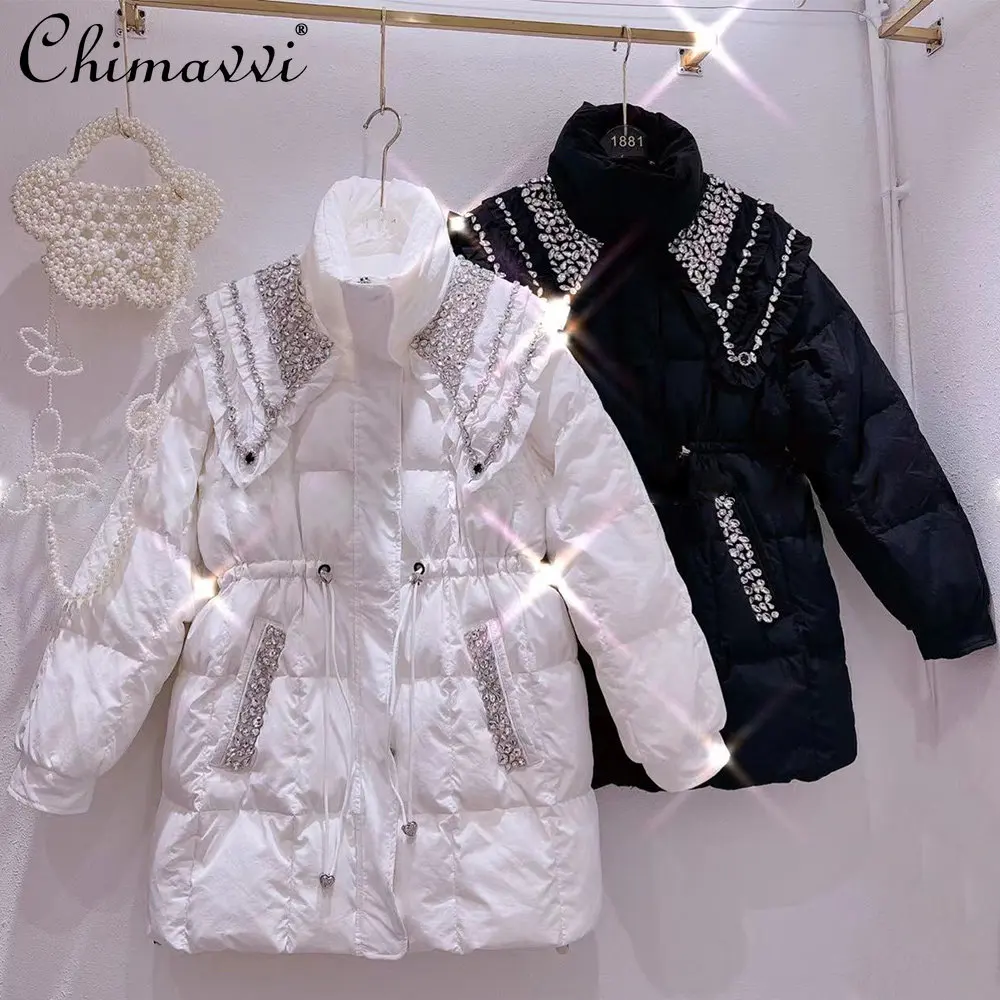

Роскошный пуховик для женщин, новинка зимы 2022, Милая Тяжелая шаль в Корейском стиле Стразы с кукольным воротником, приталенное пальто на бел...